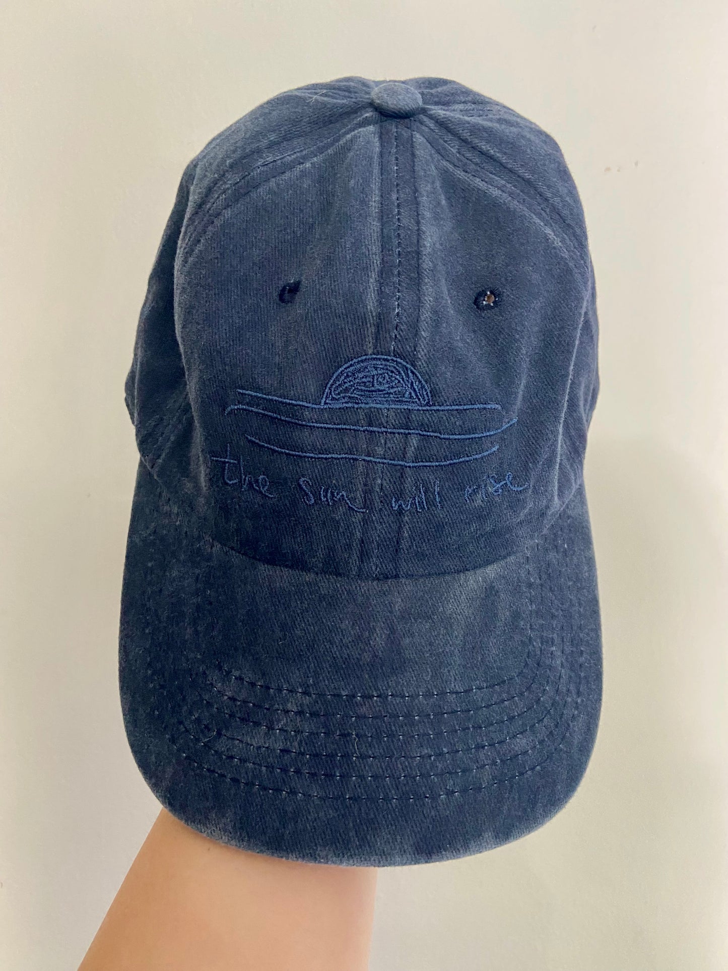 the sun will rise caps